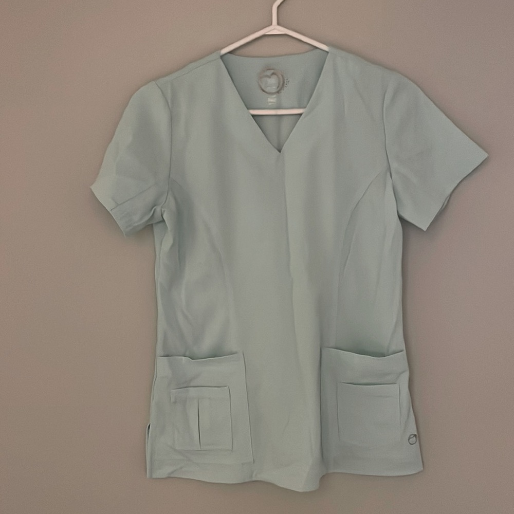 Teal Healthpro scrub top with pockets! Size XS